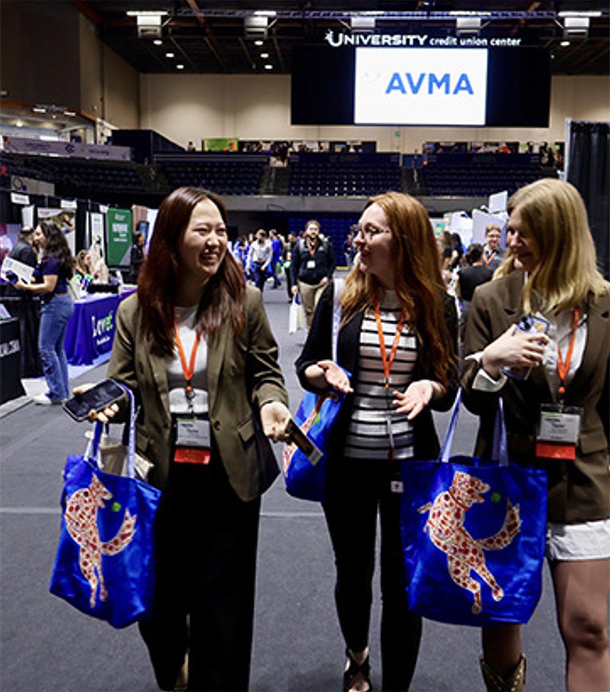 three people attending conference tabling activity