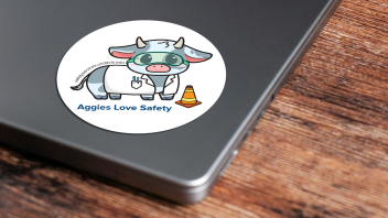 sticker with cow wearing lab safety equipment